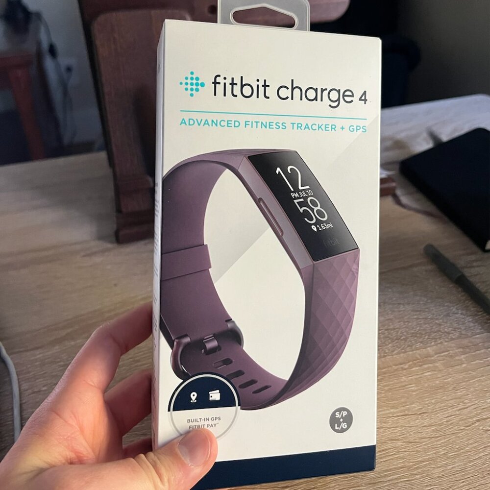 New in Box Fitbit Charge 4 -- Rosewood